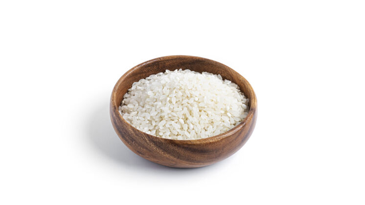 小吃木碗里的米饭被隔离在一个白色的盘子里背景高高质量的照片有机食物米饭
