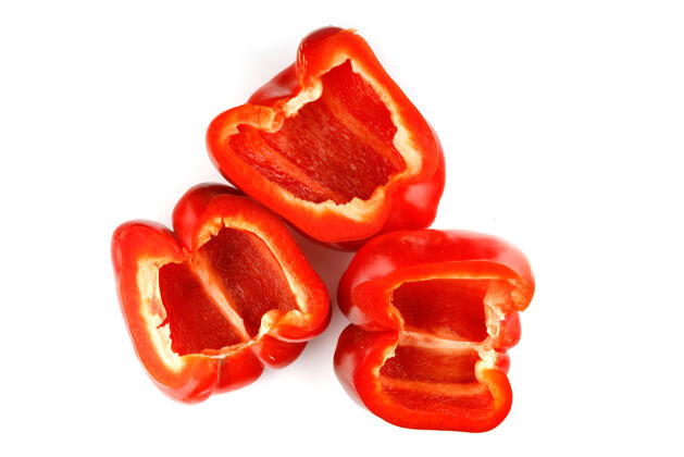 三把红甜椒切成片放在白甜椒上贝尔蔬菜厨房
