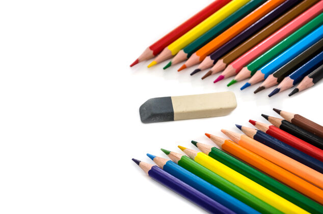 学校彩色铅笔和白色表面上的橡皮擦橡皮擦空白配件