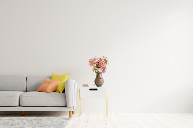 公寓空荡荡的客厅里有灰色的沙发 桌子上有装饰性的花瓶和空荡荡的白色墙壁3d渲染复制空间舒适室内