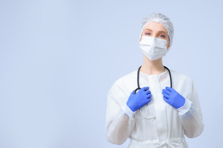 病毒戴着医疗帽和面罩的女医生或护士的肖像大流行疾病专家