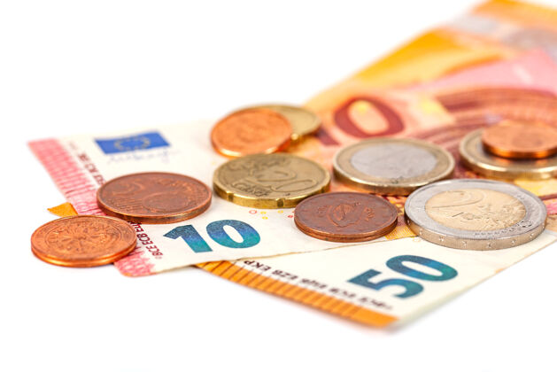 金融一堆白色的欧元硬币和钞票 钱支付金属改变