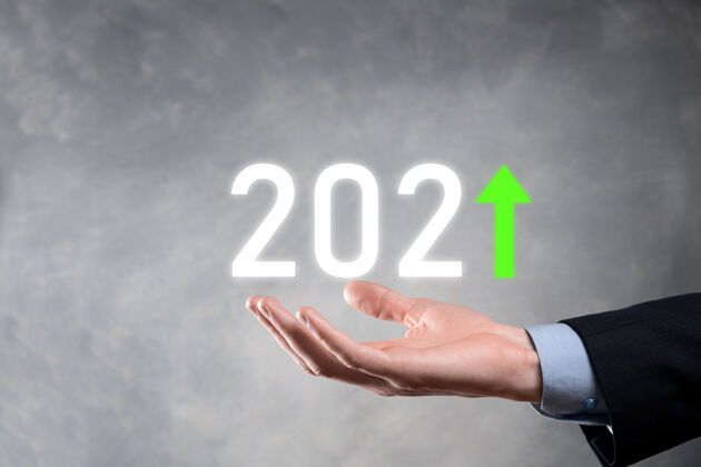 年份2021年业务发展走向成功和增长概念图2021年业务增长图概念商人计划和增加他的生意中的积极指标公司市场20202021