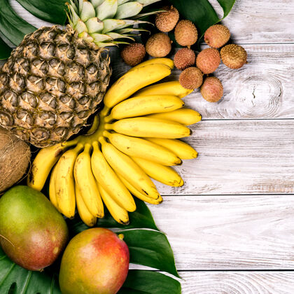 荔枝新鲜热带水果视图.香蕉 菠萝 椰子 芒果 荔枝 栗子水果甜绿色