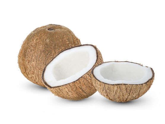 一半椰子被隔离在白色的表面上水果热带棕榈