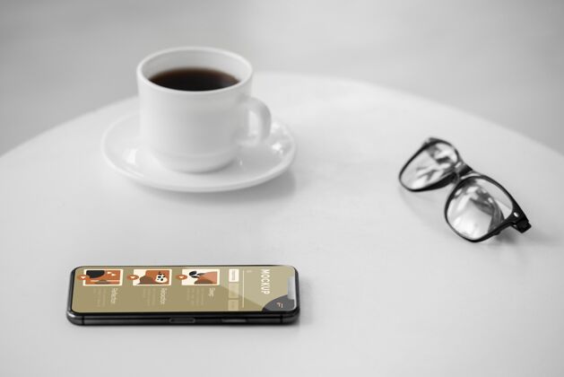 技术一杯咖啡和手机咖啡杯手机眼镜
