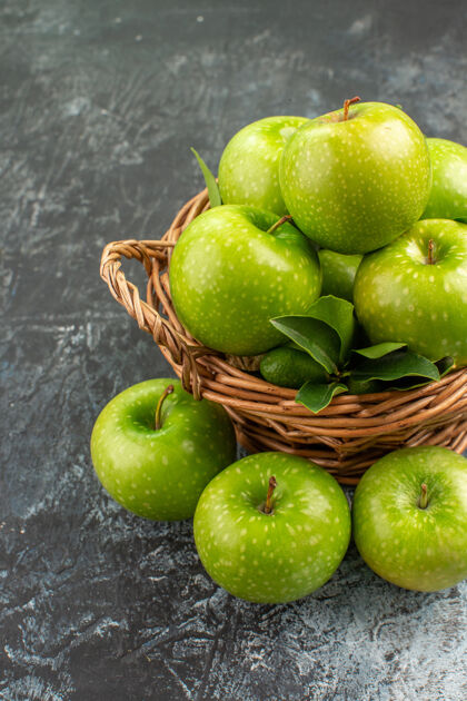 健康侧视图苹果开胃苹果叶柑橘类水果在篮子里多汁吃苹果柑橘