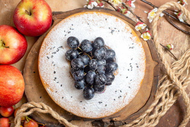 可食用的水果顶部特写镜头蛋糕一个开胃蛋糕与葡萄板绳苹果浆果新鲜零食营养