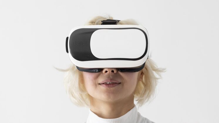 Vr眼镜戴vr眼镜的女人虚拟现实科技设备