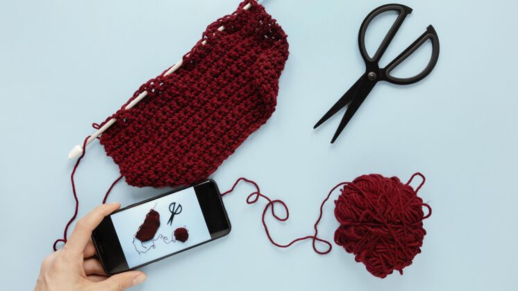 技术顶视图羊毛和针织针电话手机纺织品