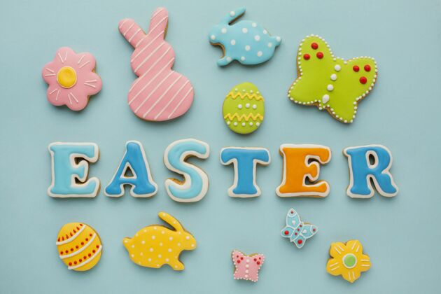 帕斯卡复活节彩蛋与兔子和蝴蝶形状俯视图节日顶视图平铺