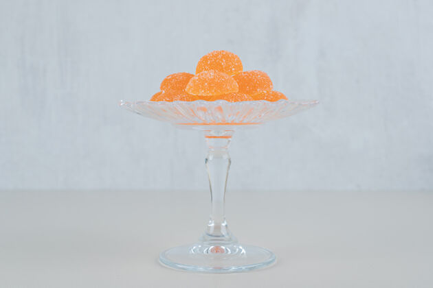 果酱一个盛着橘子糖果酱的玻璃盘子糖糖果明胶