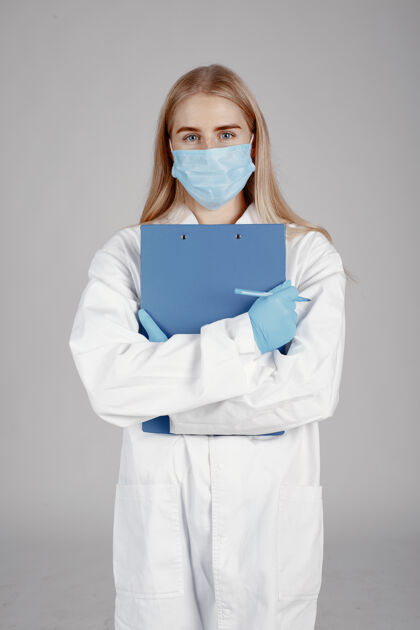 职业戴着医学面具的医生冠状病毒主题隔离在白色背景上西装临床学生