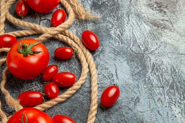 西红柿正面图新鲜的红色番茄和绳子食物植物木本植物