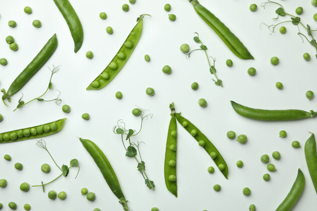 农作物绿色的豌豆荚 白色的种子和嫩枝饮食蔬菜豆荚